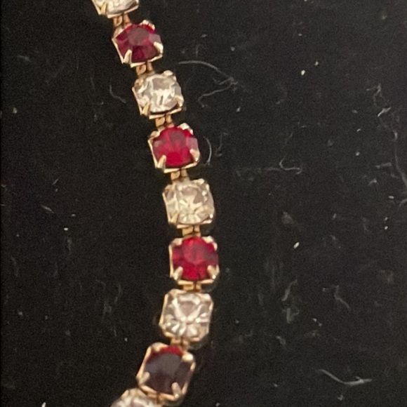 7.5” gold plated tennis bracelet with 38 prong set red and clear crystals - Picture 8 of 15